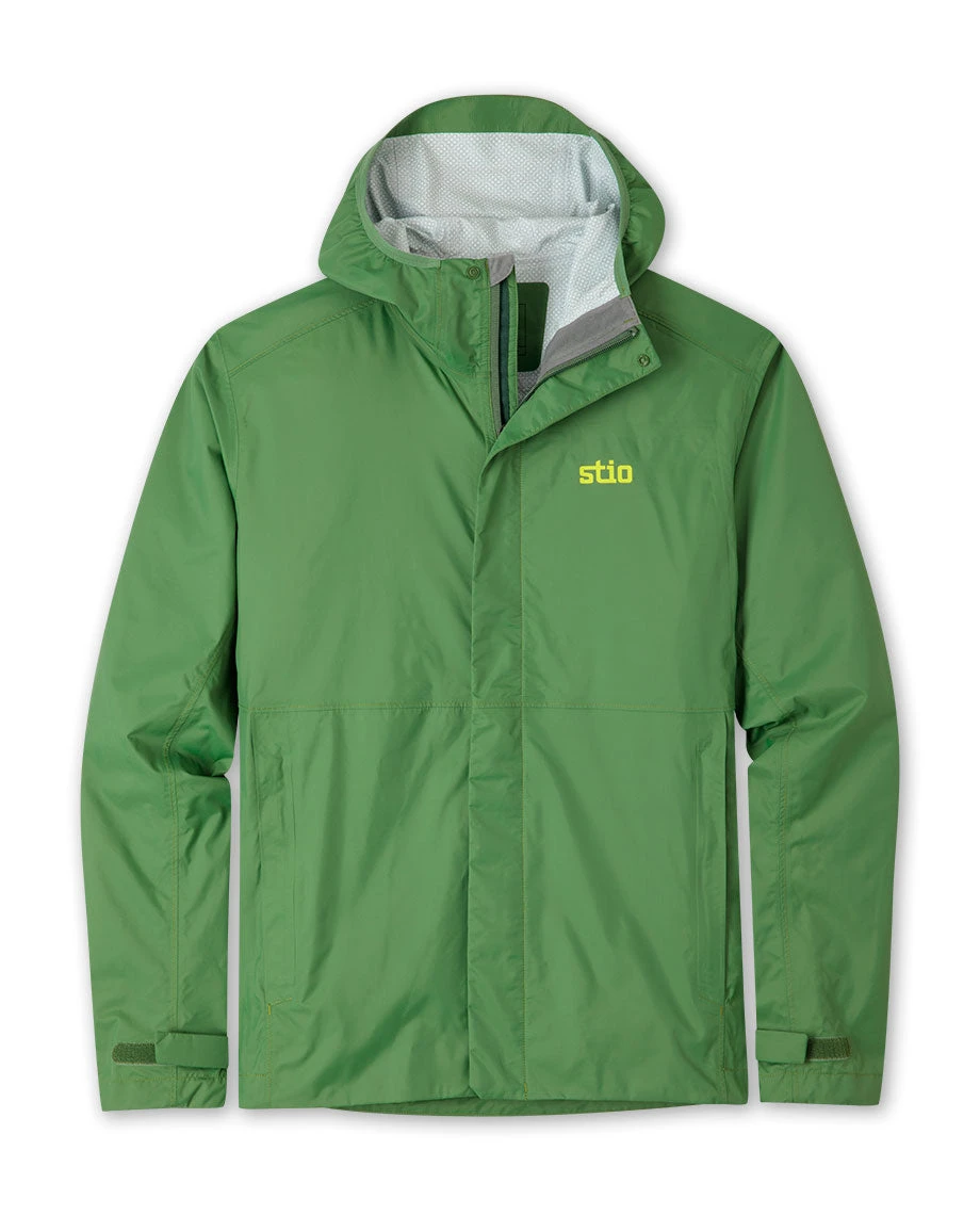 Stio Men's Rollick Hooded Jacket in forest setting