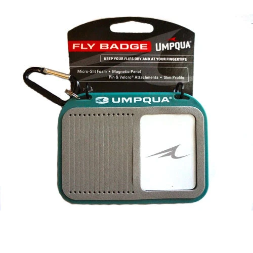 Umpqua Fly Badge attached to fishing vest