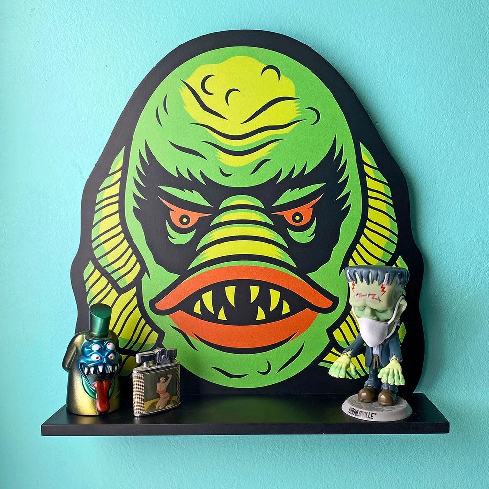 SOURPUSS CREATURE SHELF displaying monster collectibles