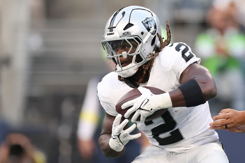 Las Vegas Raiders RB Ashton Jeanty carries the ball during a preseason game against the Seattle Seahawks at Lumen Field on August 7.
