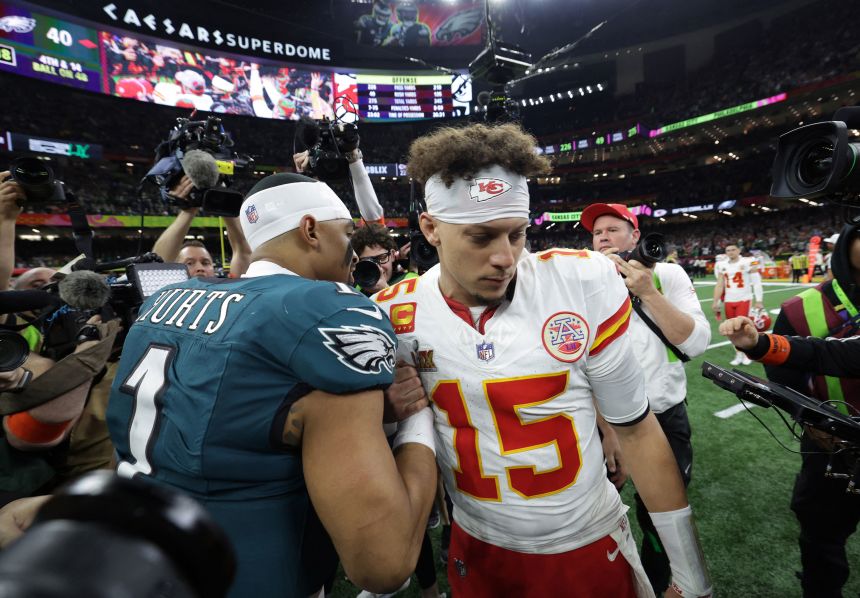 Philadelphia Eagles QB Jalen Hurts shakes hands with Kansas City Chiefs QB Patrick Mahomes after the Super Bowl.